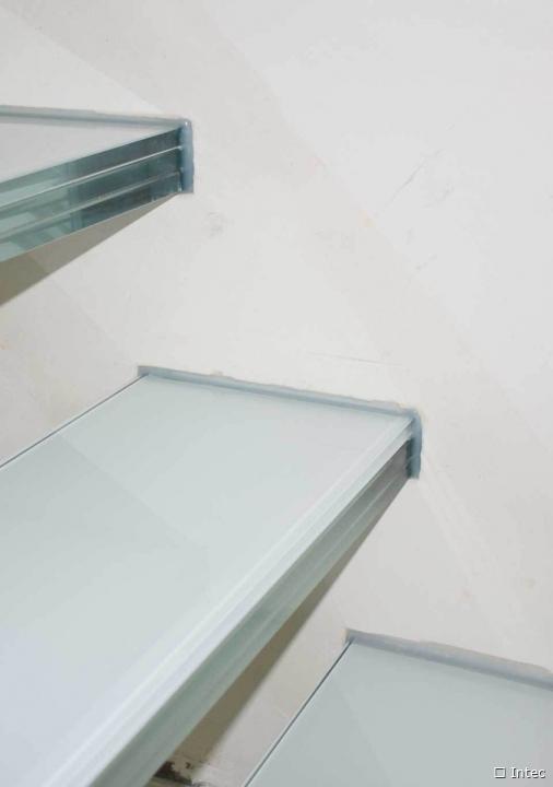 Floating glass staircase